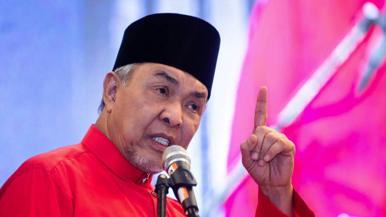 UMNO President, Datuk Seri Dr Ahmad Zahid Hamidi, delivers a speech at the 2025 UMNO Gopeng Division Delegates Meeting at the Rural Transformation Centre (RTC) Gopeng today. - BERNAMA
