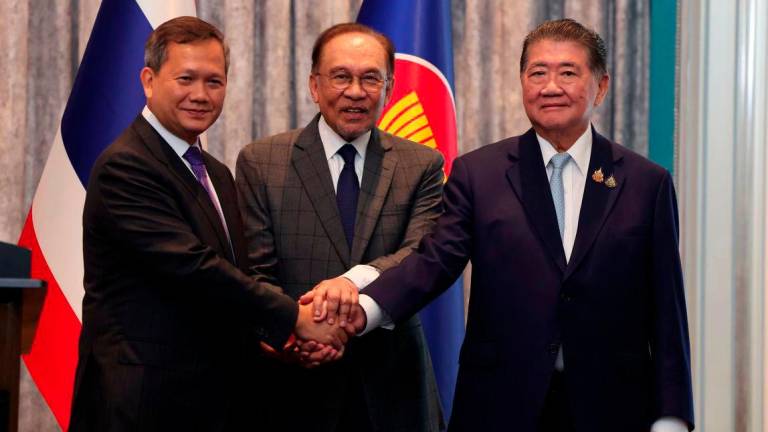 For representational pursposes - Prime Minister Datuk Seri Anwar Ibrahim (centre) witnesses Cambodian Prime Minister Hun Manet (left) shaking hands with Thailand’s Acting Prime Minister Phumtham Wechayachai (right) following a Special Joint Meeting at the Seri Perdana Complex - BERNAMAPIX