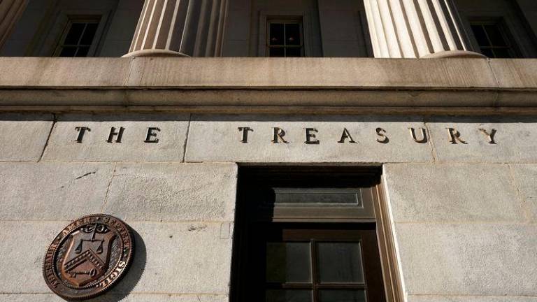 A view shows a bronze seal beside a door at the U.S. Treasury building in Washington, U.S., January 20, 2023. - REUTERSPIX