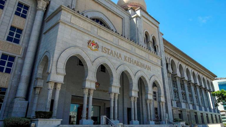 The dual role of the attorney-general as both government legal adviser and chief prosecutor has long raised concerns over political interference in sensitive cases. - SUNPIC