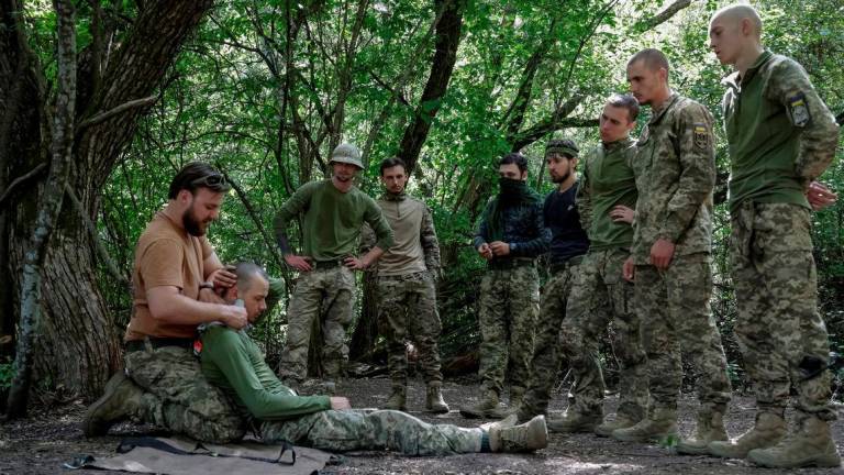 Service members of the 127th Separate Heavy Mechanized Brigade of the Ukrainian Armed Forces attend a training as recruits, amid Russia's attack on Ukraine, in Kharkiv region, Ukraine August 16, 2025. - REUTERSPIX