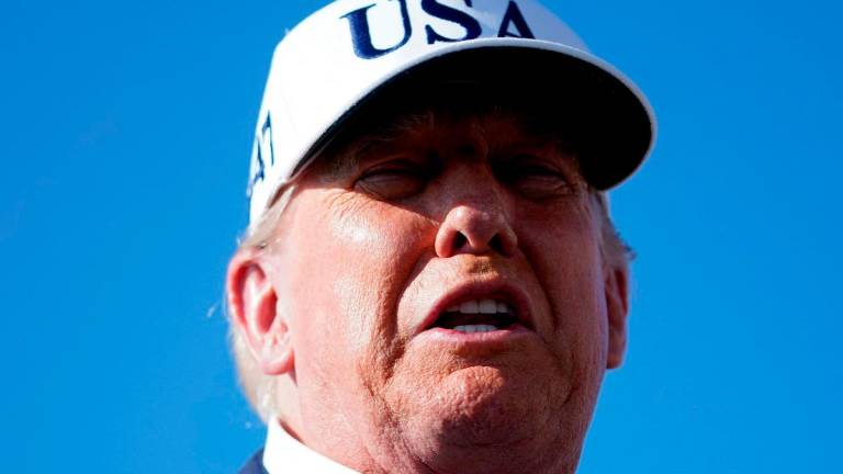 U.S. President Donald Trump speaks to members of the media upon his arrival at Morristown Airport, in Morristown, New Jersey, U.S., July 6, 2025. - REUTERS/Nathan Howard