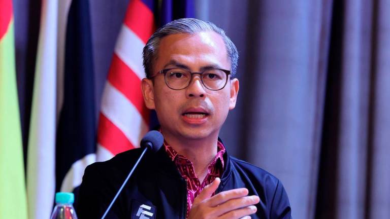 Communications Minister Datuk Fahmi Fadzil. - BERNAMA