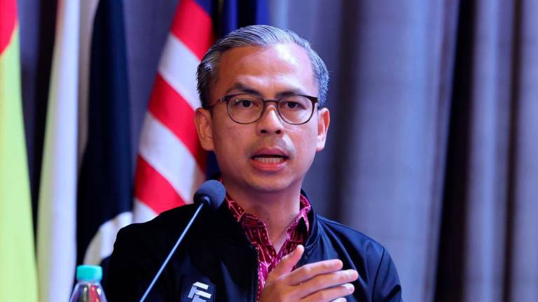 Menteri Komunikasi Datuk Fahmi Fadzil ketika berucap pada Majlis Peluncuran Platform Pendapat Awam Mengenai Tribunal Antibuli di Dewan Saksama, Bahagian Hal Ehwal Undang-Undang, Jabatan Perdana Menteri hari ini - fotoBERNAMA