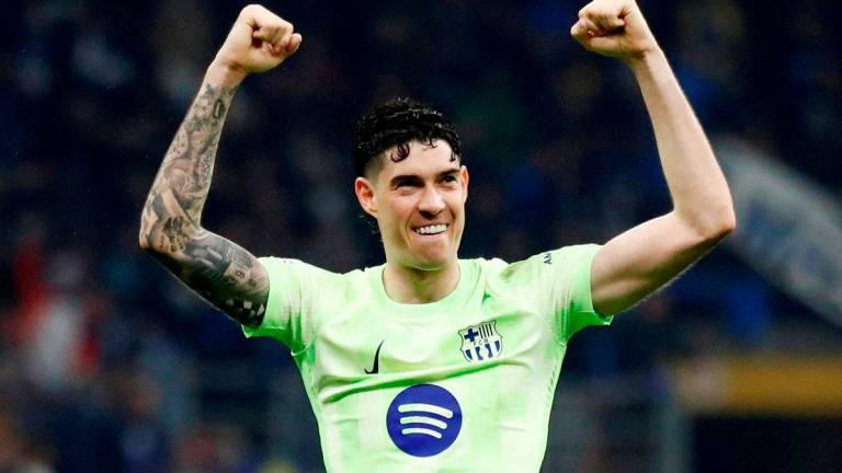 Inter Milan’s Alessandro Bastoni celebrates after the match REUTERSpix