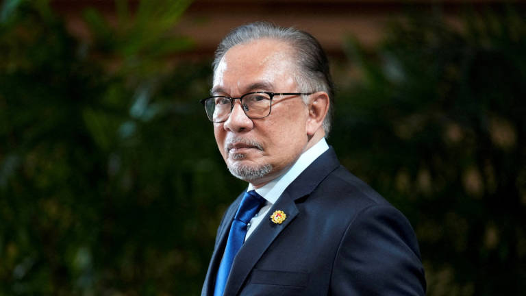 Malaysian Prime Minister Anwar Ibrahim leaves Japan's prime minister's official residence after a meeting with Japanese Prime Minister Fumio Kishida in Tokyo, Japan, May 23, 2024. -Pool via REUTERS