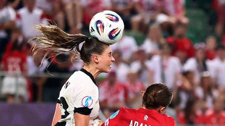 Germany’s Jule Brand in action with Poland’s Kayla Adamek- REUTERS