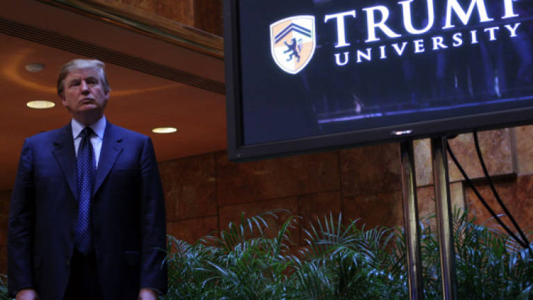 Trump settles Trump University lawsuits for US$25m
