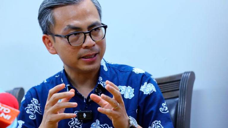 Communications Minister, Fahmi Fadzil - BERNAMApix