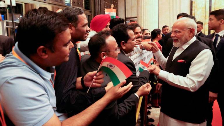 India’s Prime Minister Modi is welcomed by the Indian community upon his arrival for the Shanghai Cooperation Organisation (SCO) Summit at the hotel in Tianjin, China August 30, 2025. India’s Press Information Bureau/Handout via REUTERS