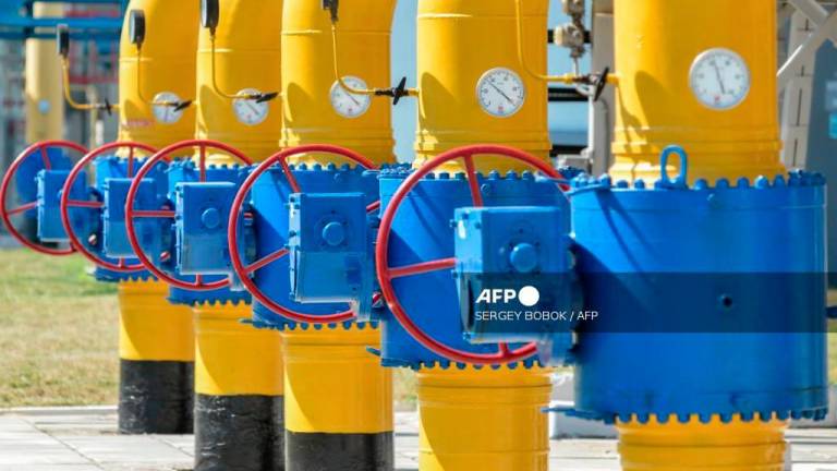 A picture shows a partial view of a compressor station of Ukraine's Naftogaz national oil and gas company near the northeastern Ukrainian city of Kharkiv on August 5, 2014. - AFPPIX