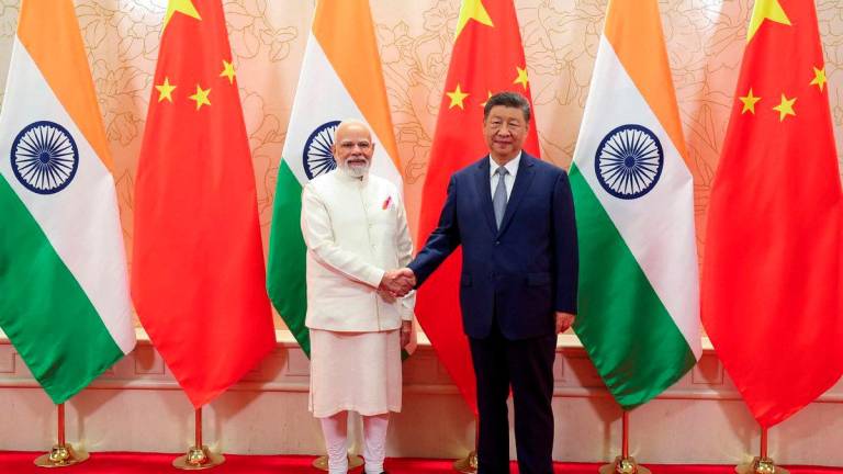 India’s Prime Minister Narendra Modi shakes hands with Chinese President Xi Jinping during a meeting on the sidelines of Shanghai Cooperation Organisation (SCO) Summit in Tianjin, China, August 31, 2025. India’s Press Information Bureau/Handout via REUTERS