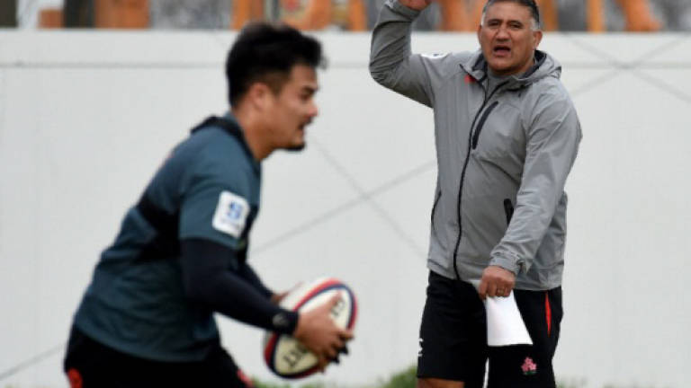 Japan coach Joseph seeks World Cup clues in Asia dust-up