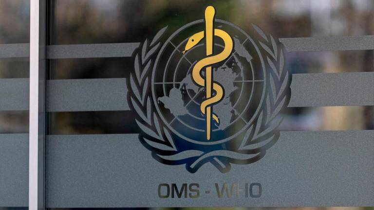 The logo of the World Health Organization is seen at the WHO headquarters in Geneva, Switzerland. - REUTERS/Denis Balibouse/File Photo