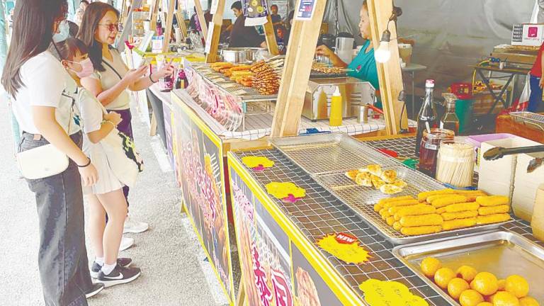 Sharifa Ezat expressed concern over the rise of sweet and junk food vendors at food festivals, where visitors continue to indulge in unhealthy fare despite the high prices. – AMIRUL SYAFIQ THESUN