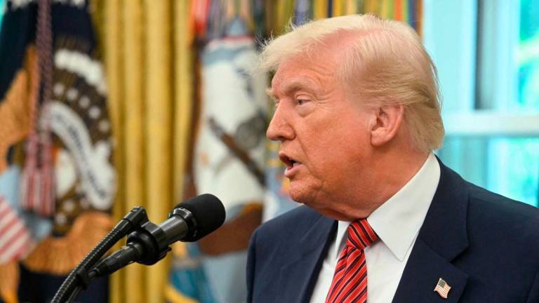 US President Donald Trump speaks during a swearing-in ceremony for the Ambassador to China, former Republican Senator of Georgia, David Perdue at the White House in Washington, DC, May 7, 2025. AFPpix