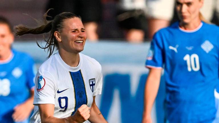 Finland’s midfielder #09 Katariina Kosola (L), next to Iceland’s midfielder #10 Dagny Brynjarsdottir (R) celebrates after she scored her team’s first goal during the UEFA Women’s Euro 2025 Group A football match between Iceland and Finland at the Arena Thun stadium in Thun on July 2, 2025-AFP
