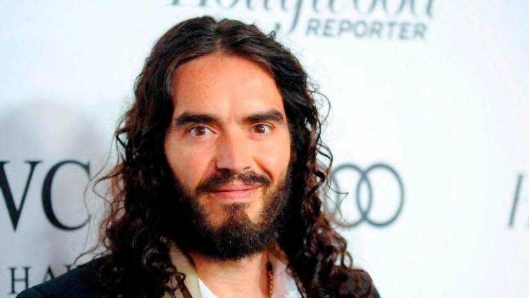 FILEpix: British actor and comedian Russell Brand arrives at the 2nd Annual Reel Stories, Real Lives event benefiting the Motion Picture &amp; Television Fund in Los Angeles, California October 20, 2012. REUTERSpix