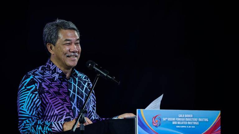 Foreign Minister Datuk Seri Mohamad Hasan delivers a speech at the Gala Dinner in conjunction with the 58th ASEAN Foreign Ministers’ Meeting (AMM) and related meetings at the Kuala Lumpur Convention Centre - BERNAMAPIX