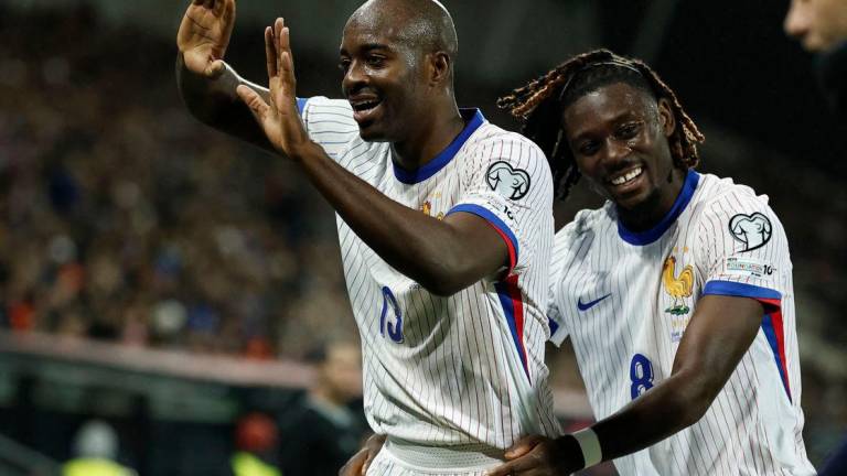 France’s Jean-Philippe Mateta celebrates scoring their second goal with Manu Kone. REUTERS