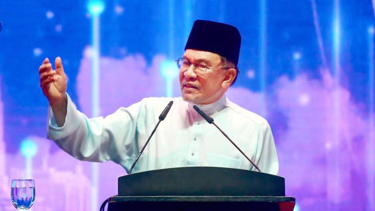 Anwar speaking at the 20th Premier Civil Service Address in Putrajaya yesterday. – theSunpix