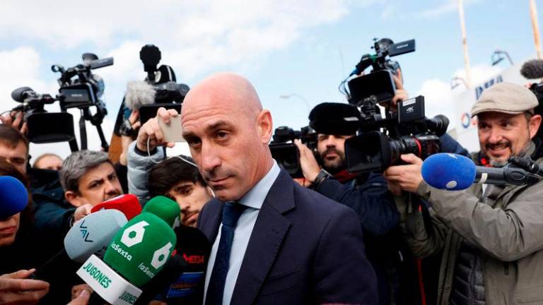 Former president of the Spanish football federation Luis Rubiales, accused of sex assault and coercion over forcible kiss, is surrounded by media as he leaves after taking the stand during his trial at the court of San Fernando de Henares, east of Madrid - AFPpix