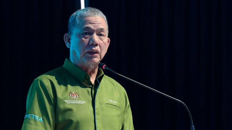 Deputy Prime Minister Datuk Seri Fadillah Yusof, who is also the Minister of Energy Transition and Water Transformation (PETRA), delivers a speech at the Opening Ceremony of the Langat 2 Water Treatment Plant in Hulu Langat today. – BERNAMA