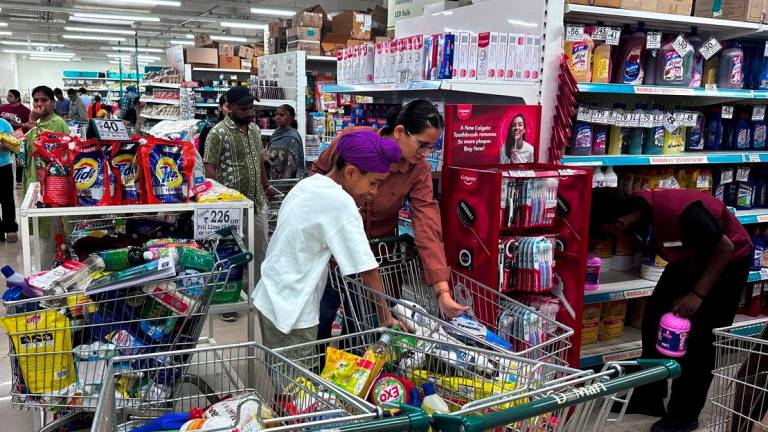 People shop for essential goods at a supermarket in Amritsar, India, May 9, 2025. - REUTERSPIX