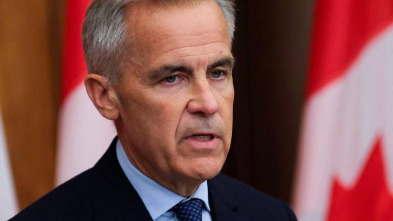 Canada’s Prime Minister Mark Carney speaks at a press conference about recognizing Palestinian statehood, in Ottawa, Ontario, Canada, July 30, 2025. REUTERS