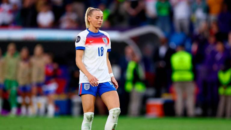 England’s Chloe Kelly before taking a penalty during the penalty shootout - REUTERS