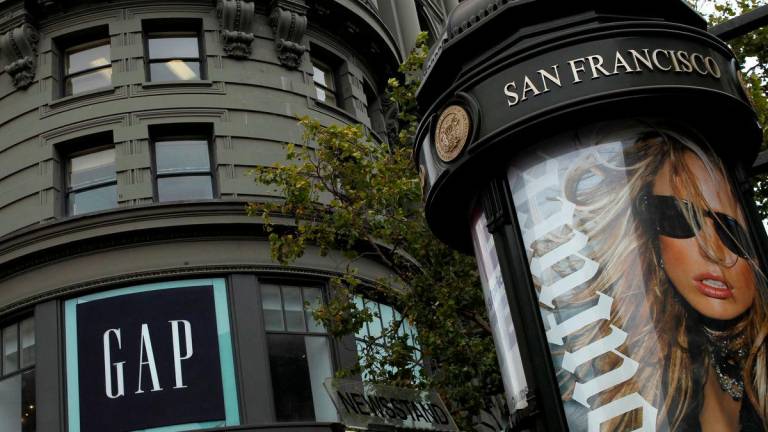 FILE PHOTO: The Gap flagship store is seen in San Francisco, California August 18, 2011. Gap Inc reported a 19 percent drop in quarterly profit on Thursday as the clothing retailer struggled to grow sales amid a weak economy, volatile raw material costs and management changes. REUTERS/Robert Galbraith (UNITED STATES - Tags: BUSINESS)/File Photo