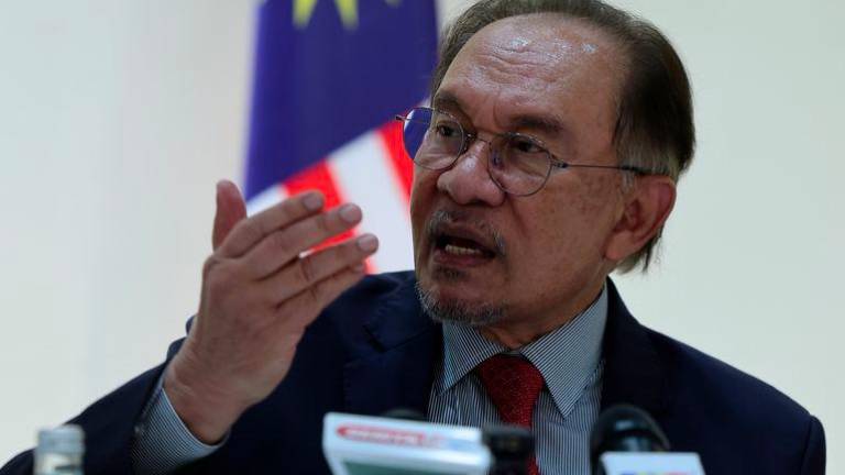 Prime Minister Datuk Seri Anwar Ibrahim speaks during a press conference before concluding his three-day working visit to the United Arab Emirates (UAE). - BERNAMAPIX