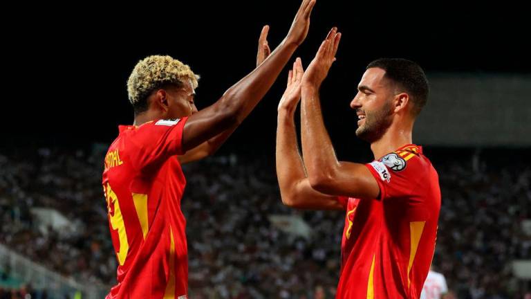Spain’s Mikel Merino celebrates scoring their third goal with Spain’s Lamine Yamal REUTERSPix