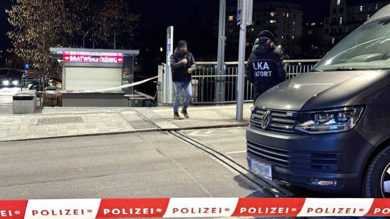 Officers of the Austrian State Criminal Police are seen near a police cordon after a knife attack near the main square in the city centre of Villach, southern Austria on February 15, 2025.- AFPPIX