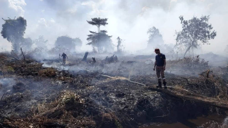 Firefighters have been working around the clock to contain dozens of ground fires across the state. – Credit: Sarawak Fire and Rescue Department
