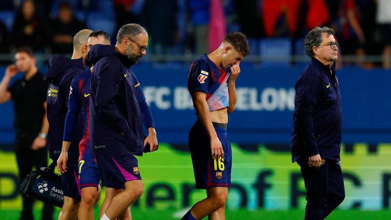FC Barcelona’s Fermin Lopez reacts after sustaining an injury after the match REUTERS/Albert Gea