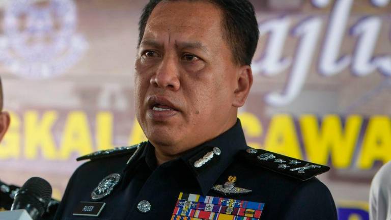 Pengarah Jabatan Siasatan Jenayah Komersial (JSJK) Bukit Aman Datuk Rusdi Mohd Isa - FotoBernama
