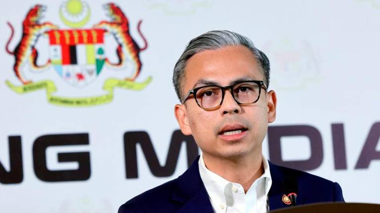 Communications Minister Datuk Fahmi Fadzil - Photo by BERNAMA