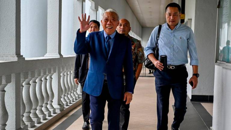 Ahli Parlimen Kinabatangan Datuk Seri Bung Moktar Radin hadir ke Mahkamah Sesyen hari ini bagi prosiding perbicaraan membela diri atas tiga pertuduhan rasuah berjumlah RM2.8 juta -fotoBERNAMA