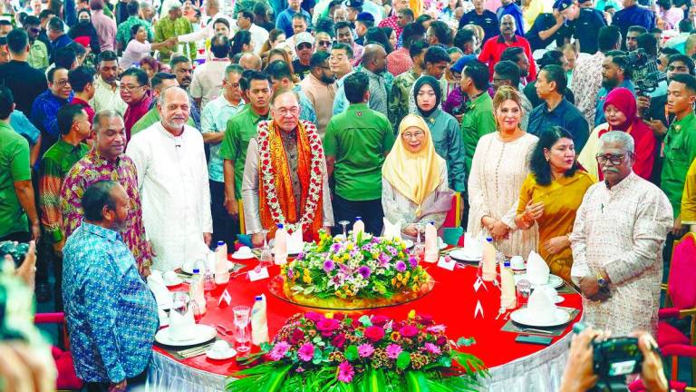 Anwar, his wife Datuk Seri Dr Wan Azizah Wan Ismail and Gobind among guests at the event at KL Sentral yesterday. – Amirul Syafiq/theSun