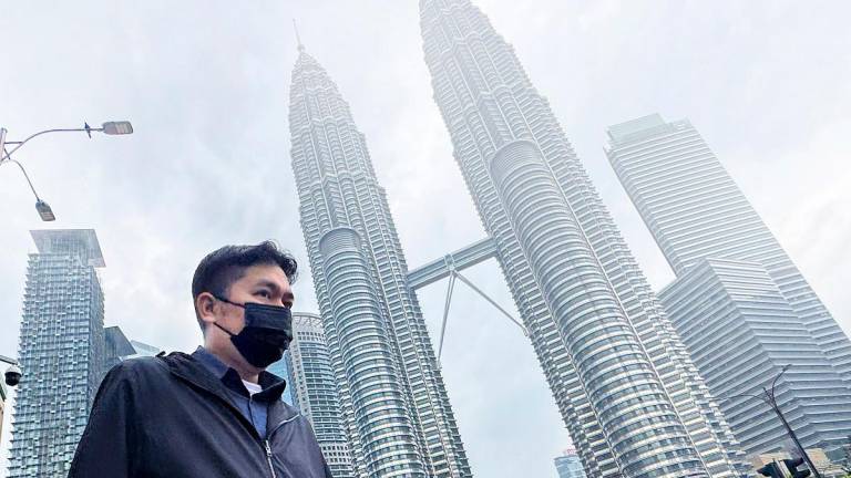 Nik Nuratiqah advised the public to wear proper protective mask, limit outdoor activities and to stay hydrated to soothe the respiratory tract. – ADAM AMIR HAMZAH/THESUN