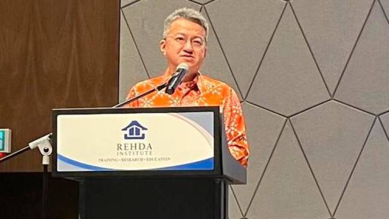 Liew delivering his speech at Rehda’s CEO Series 2025 conference in Kuala Lumpur today.