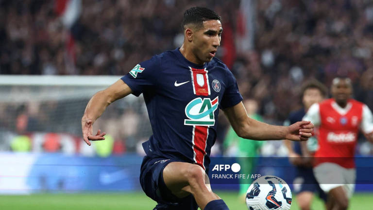 (FILES) Paris Saint-Germain's Moroccan defender #02 Achraf Hakimi runs for the ball during the French Cup final football match between Paris Saint-Germain (PSG) and Stade de Reims at the Stade de France in Saint-Denis, north of Paris, on May 24, 2025. - AFP