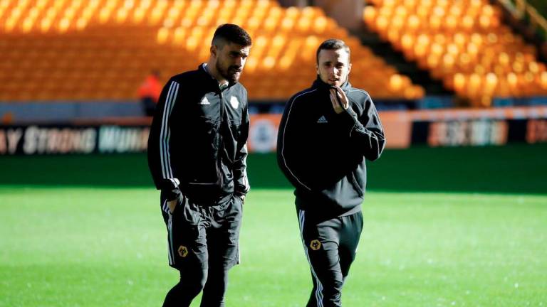 Wolverhampton Wanderers v Norwich City - Molineux Stadium, Wolverhampton, Britain - February 23, 2020 Wolverhampton Wanderers’ Diogo Jota and Ruben Neves inside the stadium before the match. - Action Images via Reuters