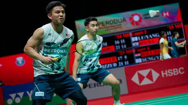 KUALA LUMPUR, 23 Mei - - Aksi beregu Lelaki negara Goh Sze Fei (kanan) dan Nur Izzuddin ketika menentang pemain Thailand Peeratchai Sukphun dan Pakkapon Teeraratsakul pada pusingan kedua perlawanan sempena Kejohanan Badminton Masters Malaysia Axiata Arena, Bukit Jalil hari ini.Malaysia menang kepada Thailand 21-17, 21-12.-- fotoBERNAMA (2024) HAK CIPTA TERPELIHARA