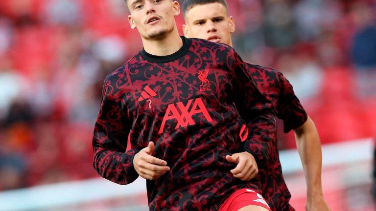 Liverpool’s German midfielder #07 Florian Wirtz. - Darren Staples / AFP
