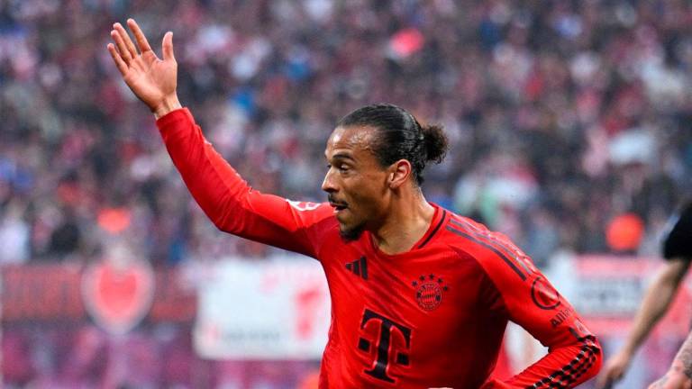 Bayern Munich’s Leroy Sane celebrates scoring their third goal REUTERSpix