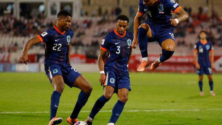 Netherlands’ Denzel Dumfries, Jurrien Timber and Donyell Malen in action REUTERS/Darrin Zammit Lupi