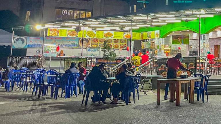 Banning 24-hour eateries could result in job losses as such establishments employ a significant number of workers. – Amirul Syafiq/theSun