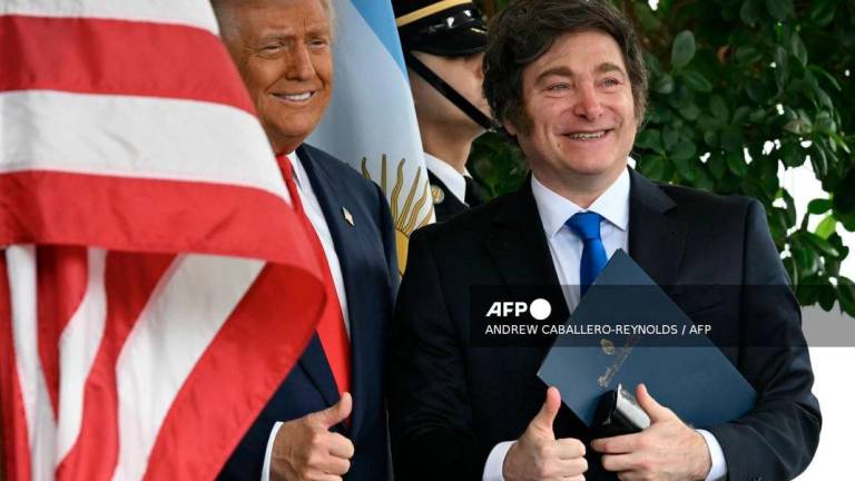 US President Donald Trump greets Argentina’s President Javier Milei at the White House in Washington. Photo by ANDREW CABALLERO-REYNOLDS / AFP.